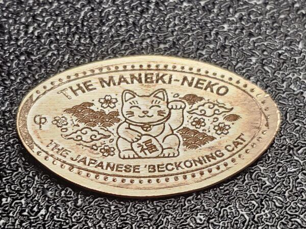 The MANEKI-NEKO Pressed Penny Penny Elongated Coin